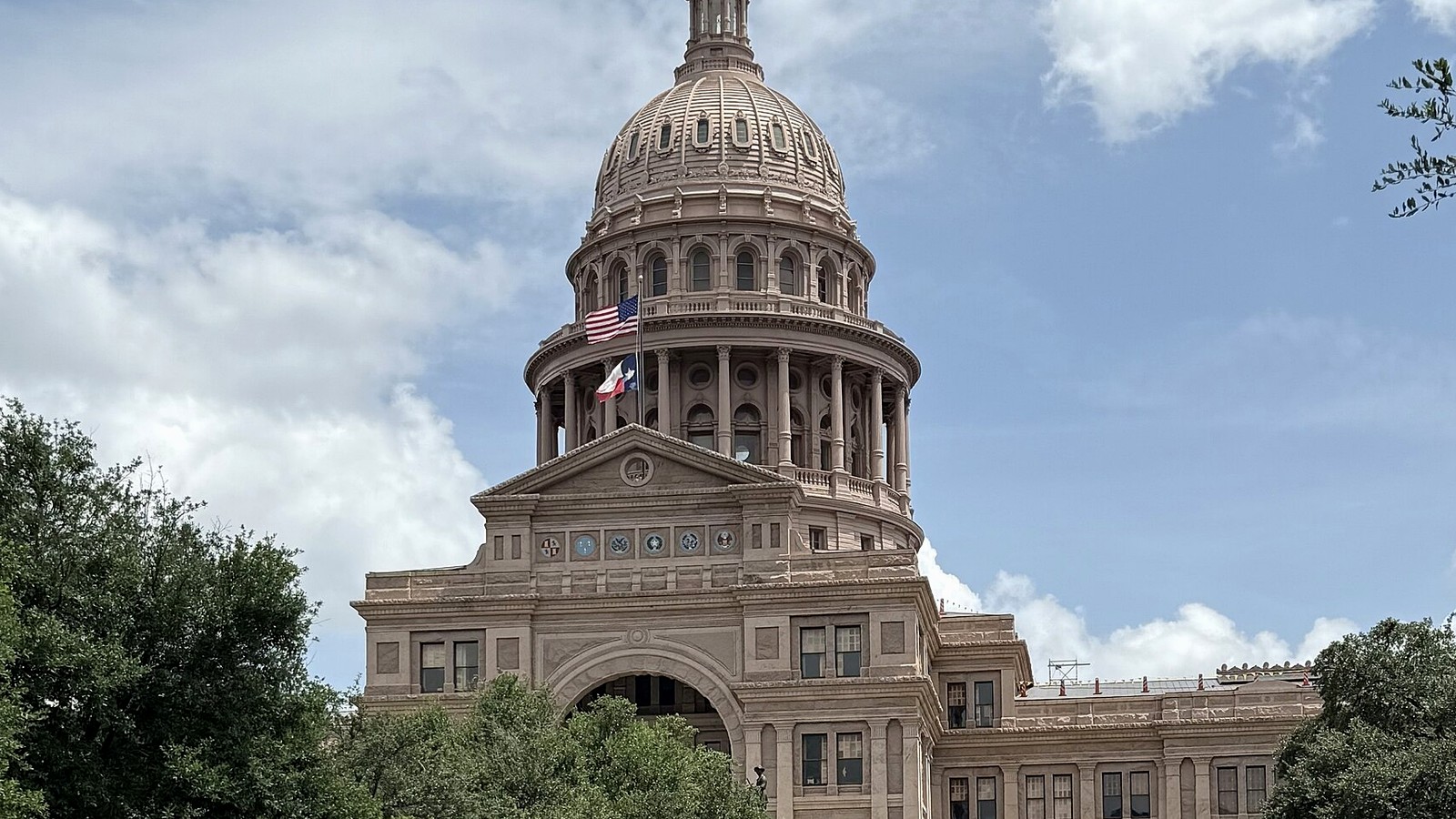 Texas State Capitol building under a blue sky in Austin